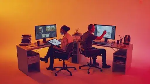 Creative professionals working on visual and gameplay elements